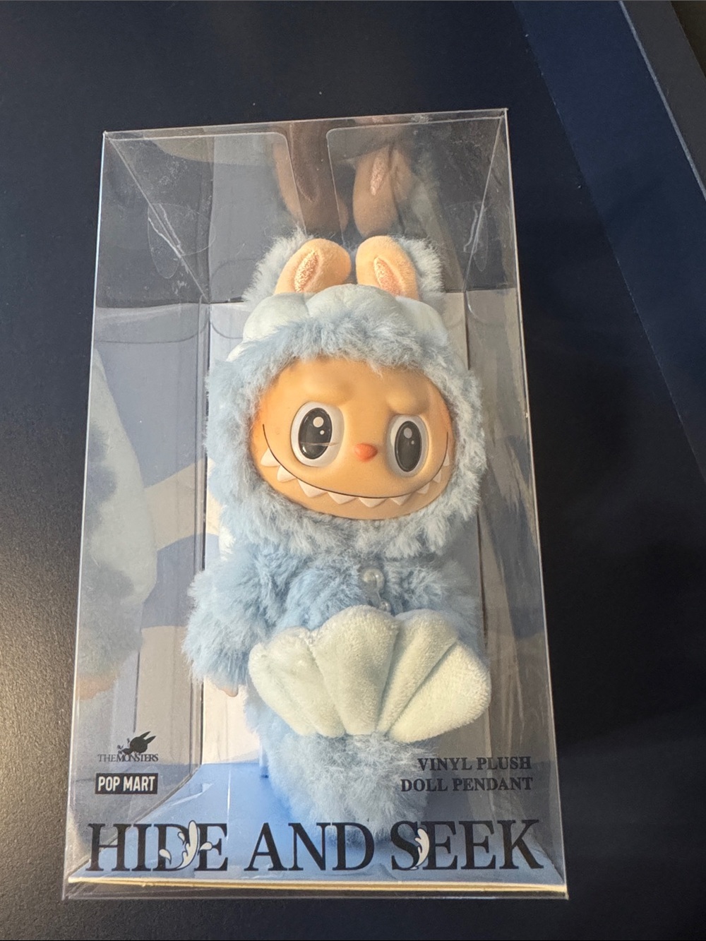 Pop Mart Hide and Seek Blue Plush Vinyl Doll Pendant.  Brand new never opened.